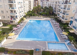 Квартира 2+1 с мебелью с видом на бассейн в Анталии