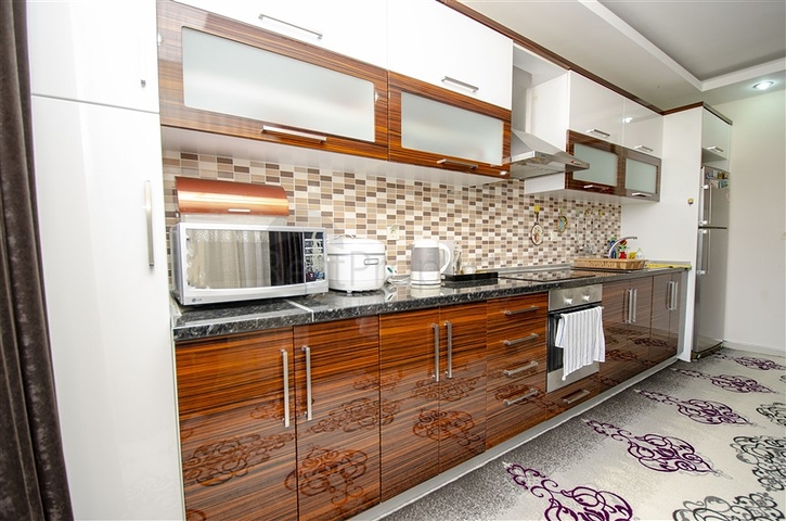 Пентхаус 5+1 с мебелью в 150 метрах от моря в Анталии