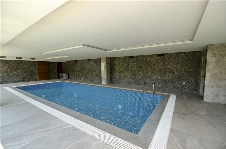 Квартира 1+1 с мебелью в районе Унжалы Коньяалты Анталья