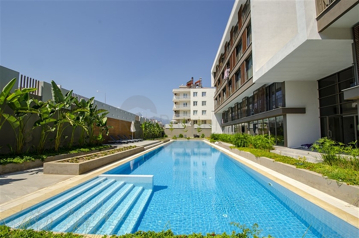 Квартира 1+1 с мебелью в районе Унжалы Коньяалты Анталья