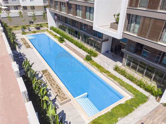 Квартира 1+1 с мебелью в районе Унжалы Коньяалты Анталья