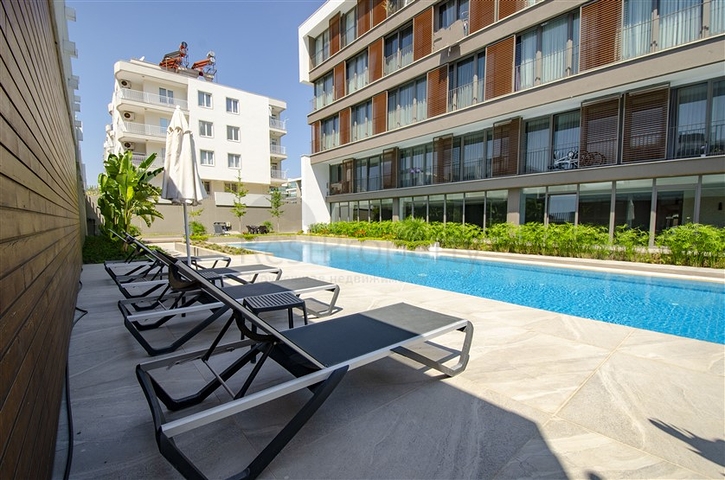 Квартира 1+1 с мебелью в районе Унжалы Коньяалты Анталья