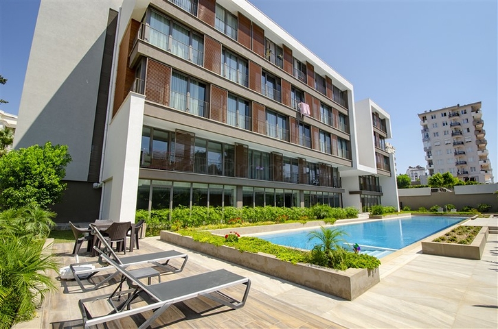 Квартира 1+1 с мебелью в районе Унжалы Коньяалты Анталья