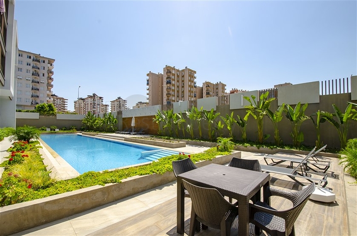 Квартира 1+1 с мебелью в районе Унжалы Коньяалты Анталья