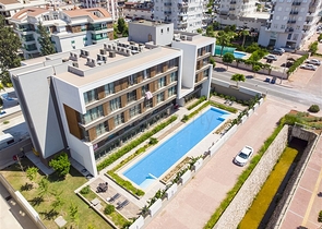 Квартира 1+1 с мебелью в районе Унжалы Коньяалты Анталья