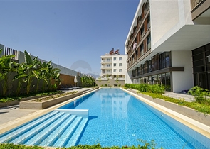 Квартира 1+1 с мебелью в районе Унжалы Коньяалты Анталья