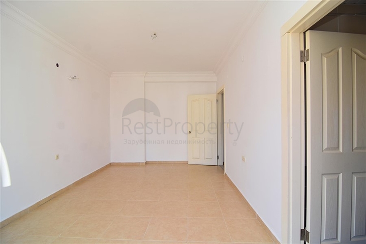 Просторные трехкомнатные апартаменты в Махмутлар