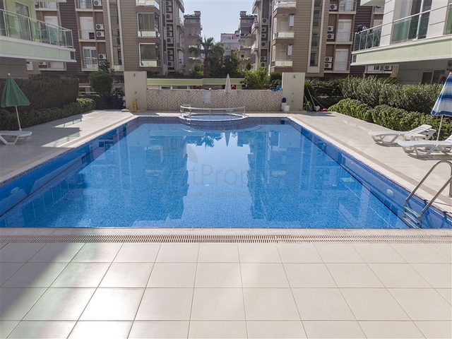 Квартира 1+1 с мебелью в Лимане Коньяалты 600 м до моря 