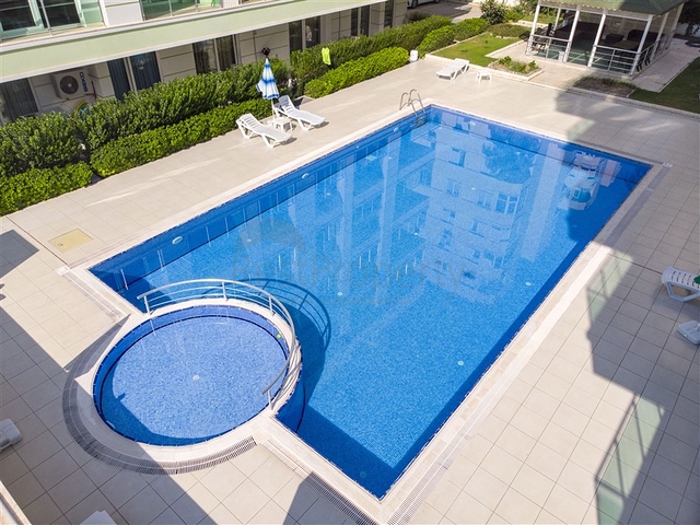 Квартира 1+1 с мебелью в Лимане Коньяалты 600 м до моря 