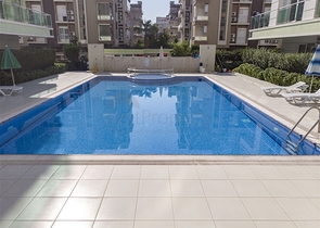 Квартира 1+1 с мебелью в Лимане Коньяалты 600 м до моря 