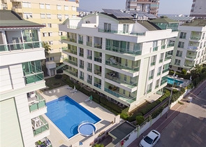 Квартира 1+1 с мебелью в Лимане Коньяалты 600 м до моря 