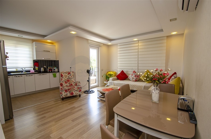 Квартира 2+1 с мебелью в 250 метрах от моря в Анталии