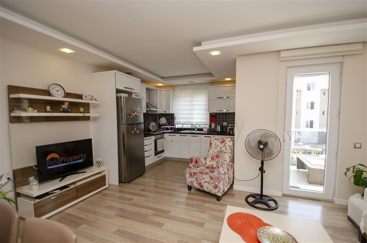 Квартира 2+1 с мебелью в 250 метрах от моря в Анталии