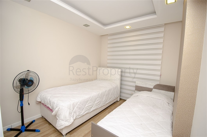 Квартира 2+1 с мебелью в 250 метрах от моря в Анталии