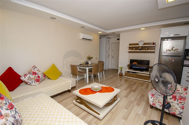 Квартира 2+1 с мебелью в 250 метрах от моря в Анталии