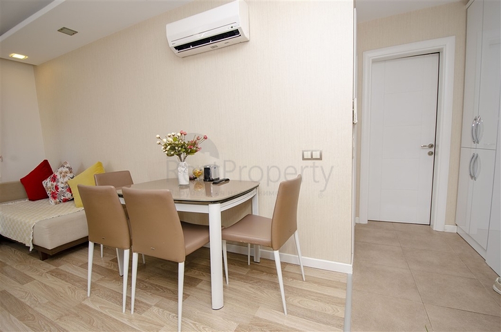 Квартира 2+1 с мебелью в 250 метрах от моря в Анталии