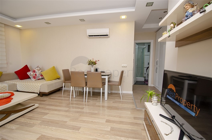 Квартира 2+1 с мебелью в 250 метрах от моря в Анталии