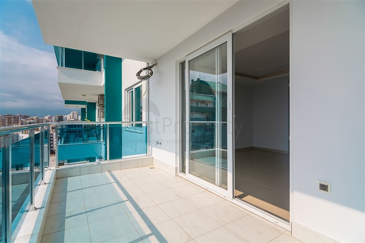 Двухкомнатная квартира в районе Махмутлар