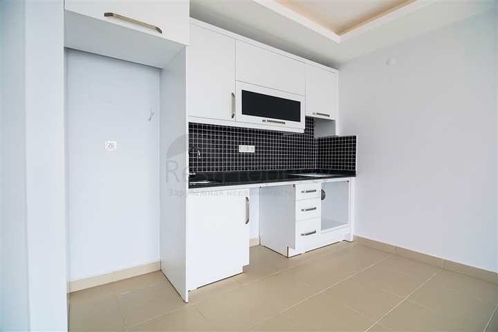 Двухкомнатная квартира в районе Махмутлар