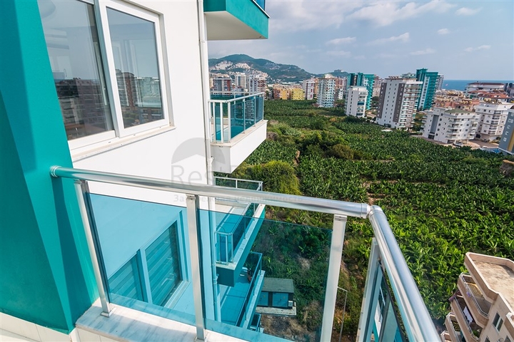 Двухкомнатная квартира в районе Махмутлар