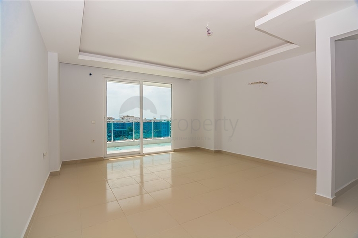 Двухкомнатная квартира в районе Махмутлар