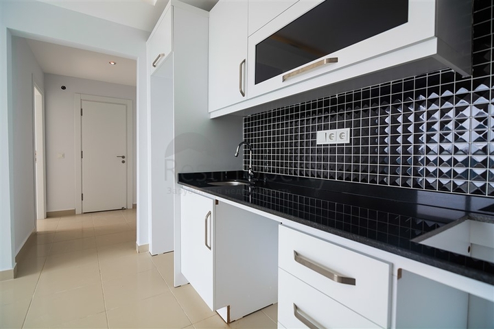 Двухкомнатная квартира в районе Махмутлар