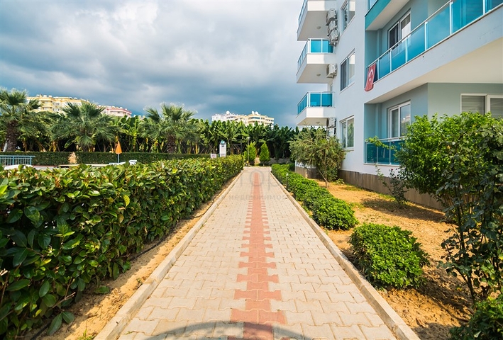 Двухкомнатная квартира в районе Махмутлар