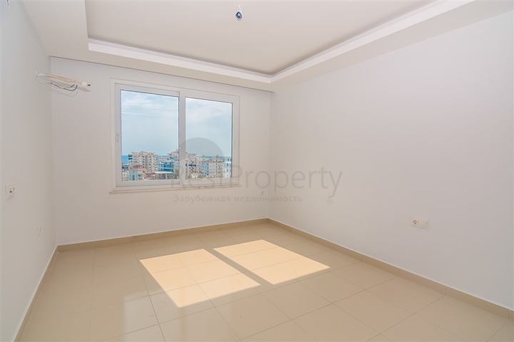 Двухкомнатная квартира в районе Махмутлар