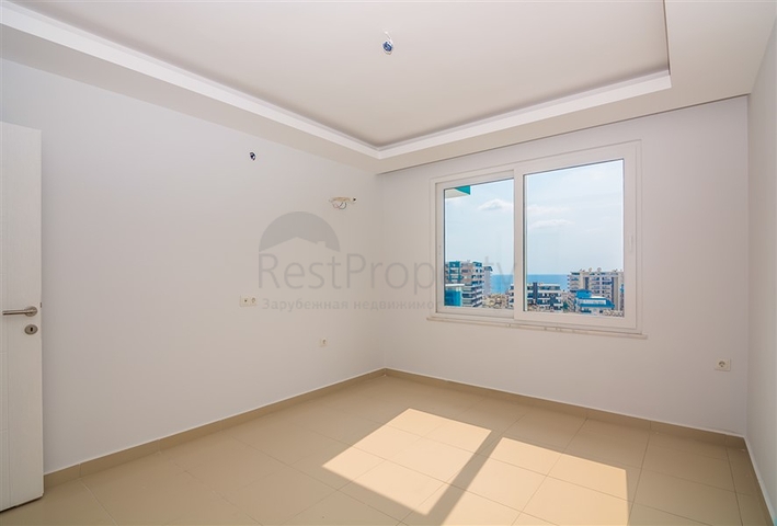 Двухкомнатная квартира в районе Махмутлар