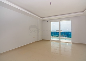 Двухкомнатная квартира в районе Махмутлар