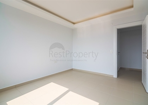 Двухкомнатная квартира в районе Махмутлар