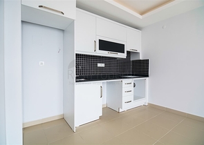 Двухкомнатная квартира в районе Махмутлар