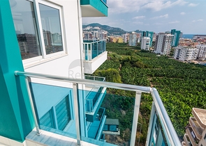 Двухкомнатная квартира в районе Махмутлар