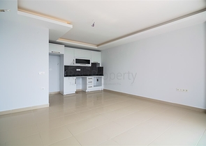 Двухкомнатная квартира в районе Махмутлар