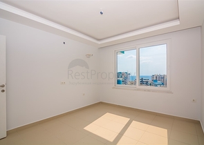 Двухкомнатная квартира в районе Махмутлар