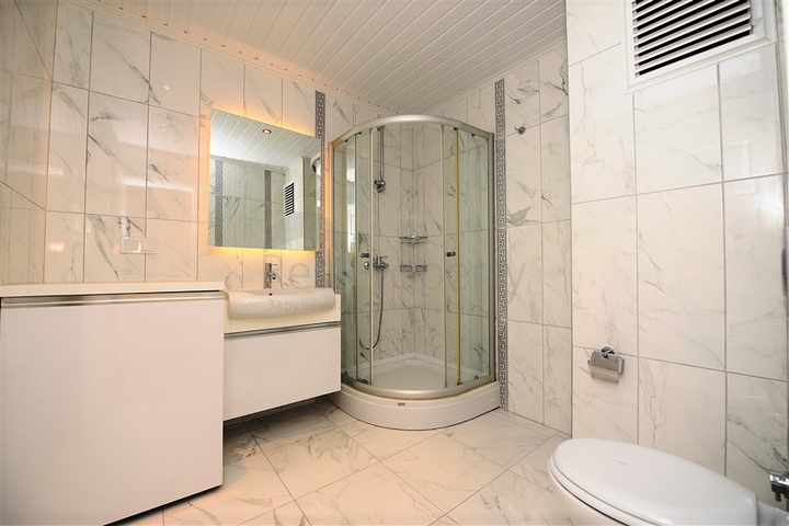 Квартира с тремя спальнями в Махмутларе