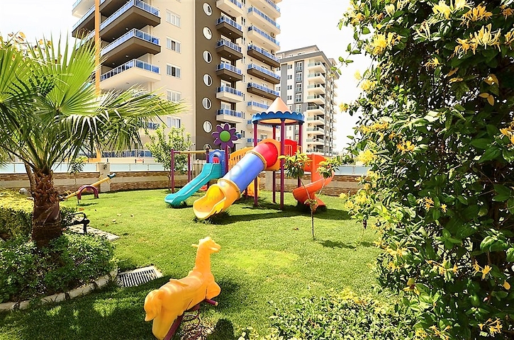 Квартира с тремя спальнями в Махмутларе