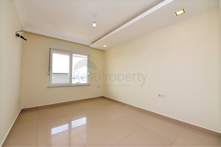 Квартира с тремя спальнями в Махмутларе