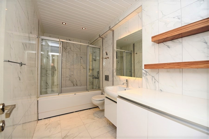 Квартира с тремя спальнями в Махмутларе