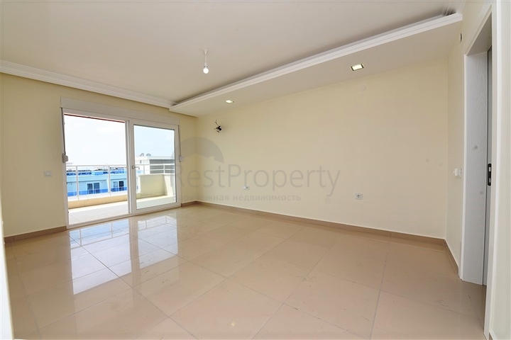 Квартира с тремя спальнями в Махмутларе