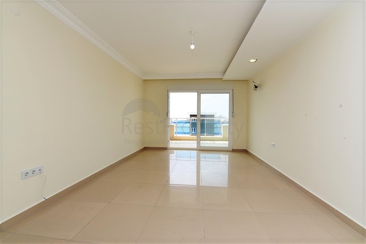 Квартира с тремя спальнями в Махмутларе