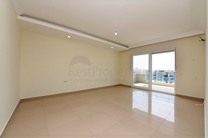 Квартира с тремя спальнями в Махмутларе