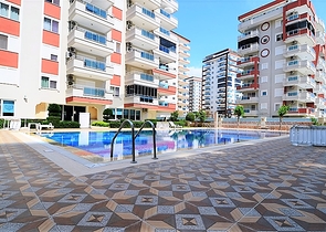 Квартира с тремя спальнями в Махмутларе