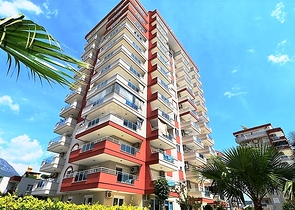 Квартира с тремя спальнями в Махмутларе