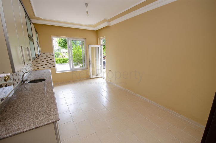 Двухкомнатная квартира с отдельной кухней в Арапсую Коньяалты 