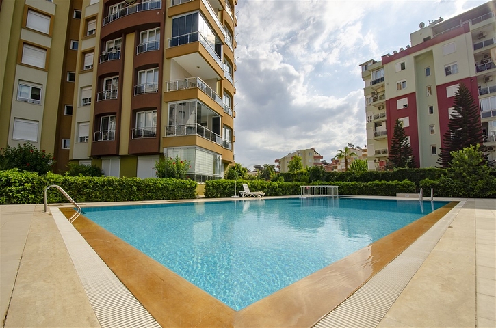 Двухкомнатная квартира с отдельной кухней в Арапсую Коньяалты 