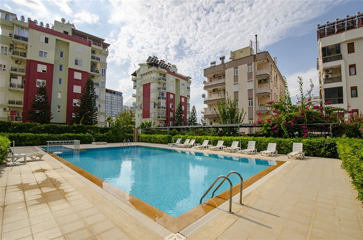 Двухкомнатная квартира с отдельной кухней в Арапсую Коньяалты 