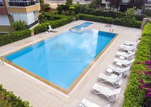 Двухкомнатная квартира с отдельной кухней в Арапсую Коньяалты 