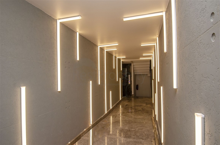 Элитный проект на первой береговой линии в районе Лара Анталья