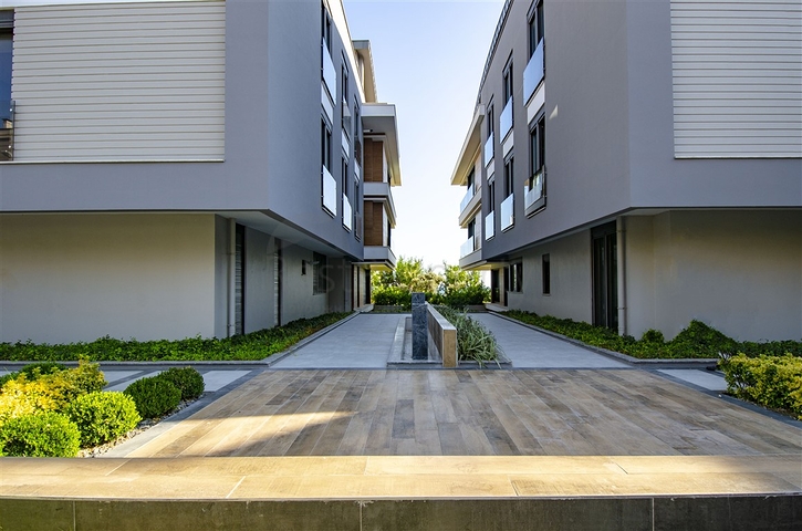 Элитный проект на первой береговой линии в районе Лара Анталья